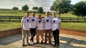 Nick (centre) with friends in 'With Josh in Mind' t-shirts