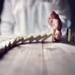 Stop the domino effect concept for business solution and interve