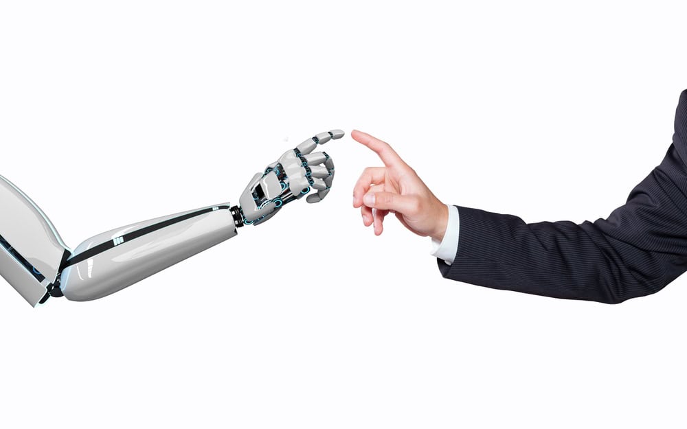Depositphotos_223581064_S Futuristic robot hand reaching out to human hand, symbolising technology and innovation.