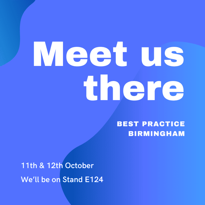 CAJA group at Birmingham event booth for innovative construction solutions and expertise in building technology.