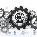 People in cogs graphics against office background